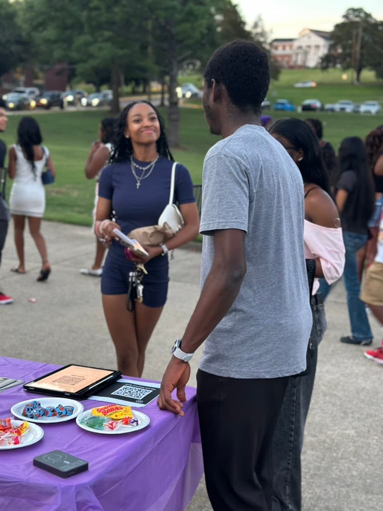 CCF outreach with Bible study flyers and campus visitors