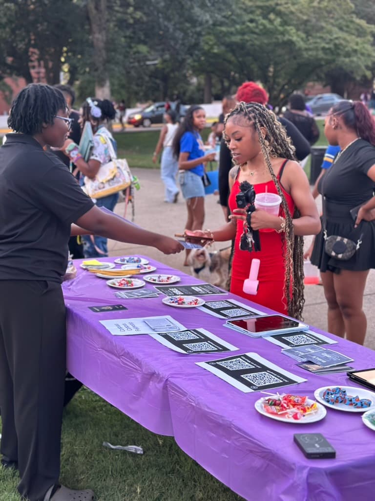 Passing along CCF materials during a campus organization fair